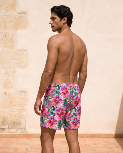 Vibrant Tropical Bloom men's swim trunks back view